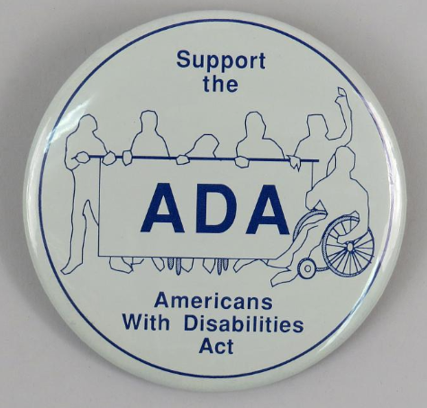 A plain button with a blue printed image and text that reads "Support ADA - Americans with Disabilities Act" The image shows the silhouette of people in a line holding hands, representing disabilities that use mobility aids like wheelchairs or canes. 