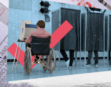 A man using a wheelchair sits at a polling station to vote. Two people stand behind curtains in polling stations next to him. An artist superimposed a giant red check mark behind the image. 