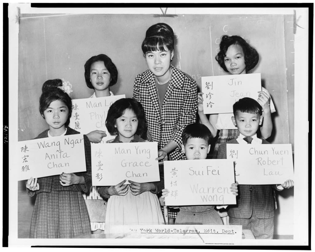 Children recently arrived at a New York City public school from Hong Kong and Formosa with their teacher in a 1964 newspaper photo