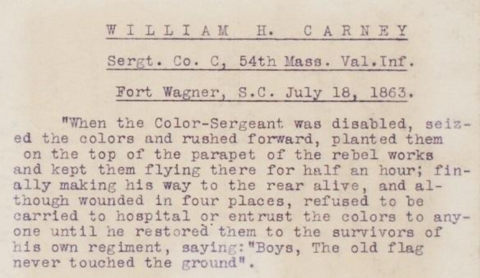 The printed card says, “William H. Carney, Sergeant, 54th Massachusetts, Fort Wagner, SC, July 18, 1863. When the Color-Sergeant was disabled, seized the colors and rushed forward.” 